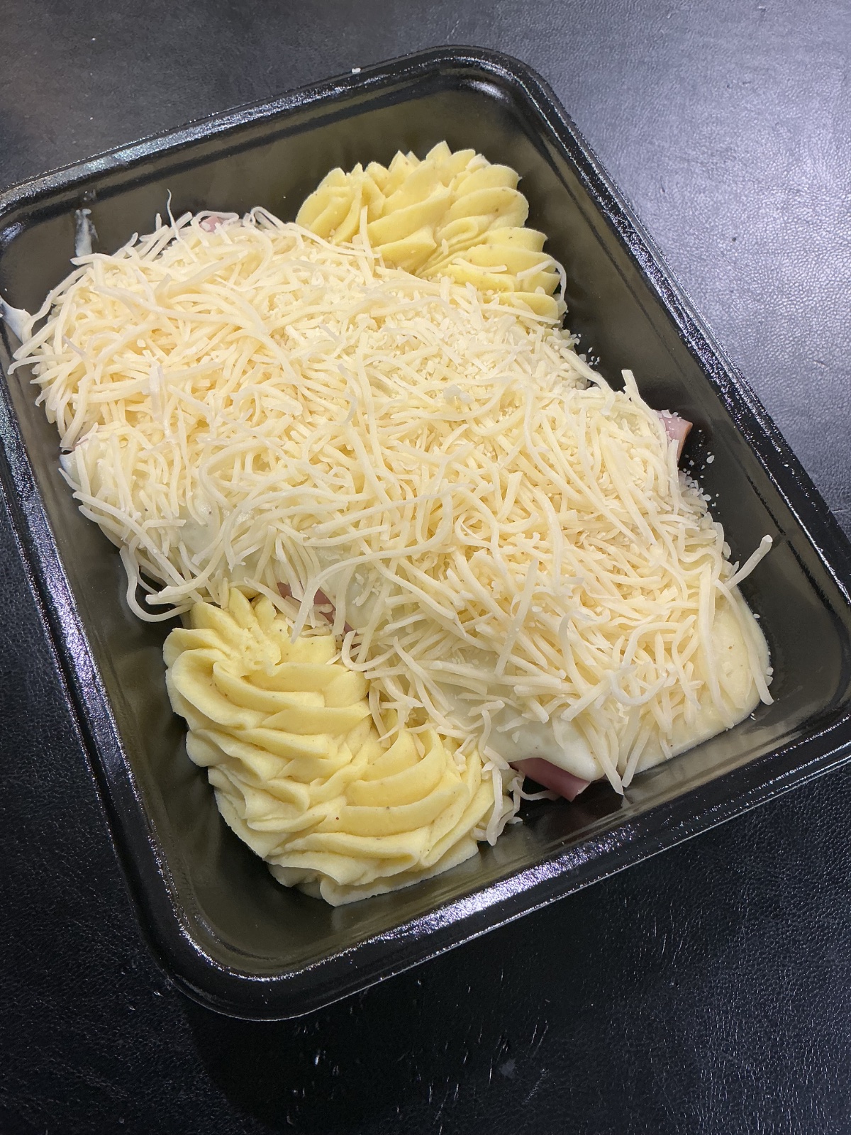 Witloof in hesp en kaassaus met puree